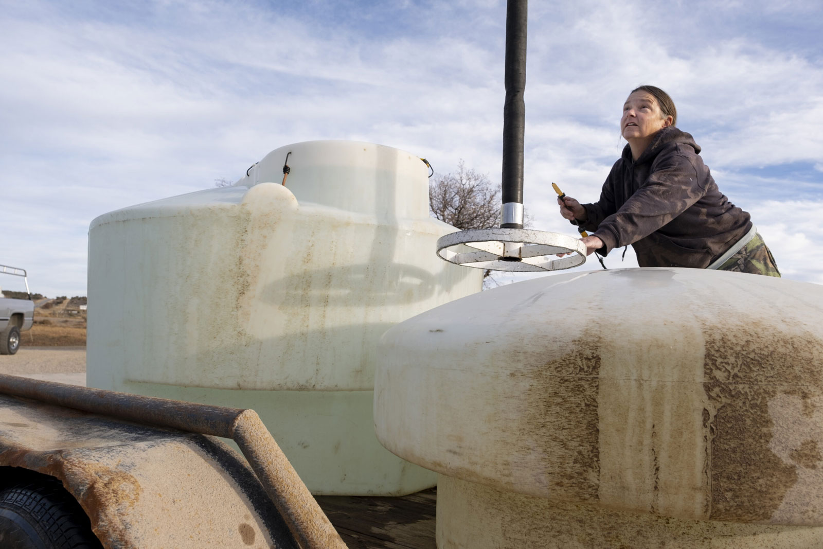 La Plata county residents fill up their water tanks at the La Plata Archuleta Water District’s bulk water fill station